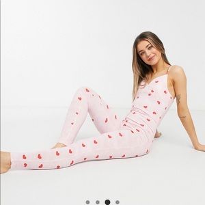Tie-dye pink pajama jumpsuit with hearts